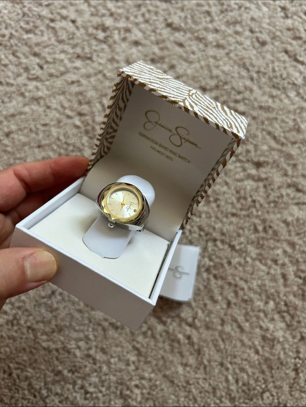 Jessica Simpson elastic ring watch.